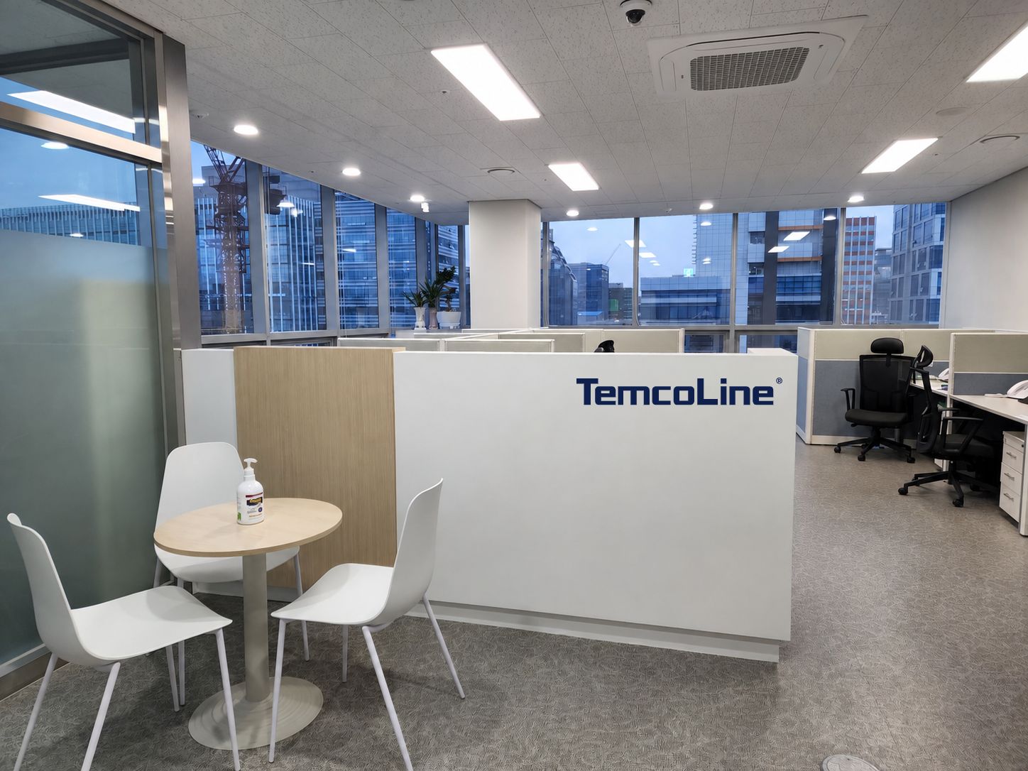 Office space at TemcoLine's Seoul headquarters, with the official company logo and windows